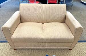 FABRIC LOVESEAT- TANLOCATION SENIOR COMMONS (ROOM 110)