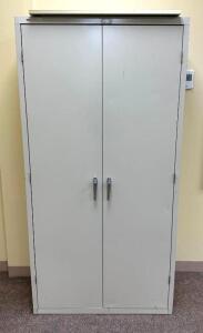 2-DOOR METAL STORAGE CABINETLOCATION ROOM 106SIZE: 36" X 24" X 22"