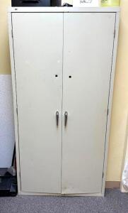 2-DOOR METAL STORAGE CABINETINFORMATION: CONTENTS NOT INCLUDEDLOCATION TEACHER STORE ROOMSIZE: 36" X 24" X 72"