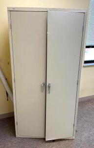 2-DOOR METAL STORAGE CABINETLOCATION ACROSS FROM ROOM 212SIZE: 36" X 24" X 72"