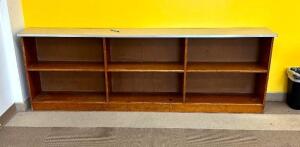 96" X 12" X 32" WOODEN BOOKSHELFLOCATION ROOM 212SIZE: 96" X 12" X 32"