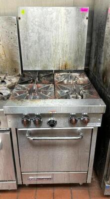 SOUTHBEND FOUR BURNER GAS RANGE W/ LOWER OVEN.