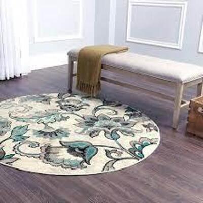 DESCRIPTION: (1) AREA RUG BRAND/MODEL: HOME DYNAMIX #HD6200-128 INFORMATION: IVORY - BLUE RETAIL$: $64.27 EA SIZE: 7'10" ROUND QTY: 1