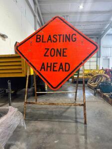 (2) BLASTING METAL ZONE ROAD SIGNS