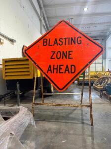 (2) BLASTING METAL ZONE ROAD SIGNS