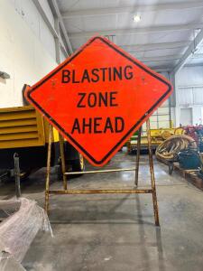 (2) BLASTING METAL ZONE ROAD SIGNS