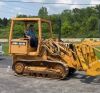 EXCAVATOR WITH BUCKET ATTACHMENT