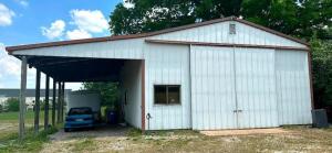 40'X30' SHED WITH CAR PORT AND BARN DOOR ENTRY