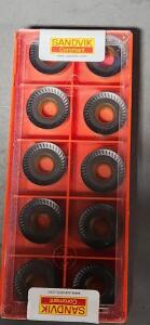 DESCRIPTION: (20) RCKT CARBIDE MILLING INSERTS BRAND/MODEL: SANDVIK RCKT 20 06 MO-MM 2040 RETAIL$: 28.47 OER INSERT QTY: 20