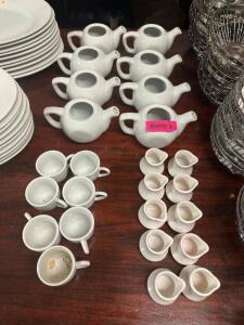 (1) LOT OF ASSORTED TEA AND ESPRESSO MUGS, CREAMER DECANTERS, AND KETTLES.