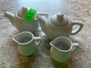 DESCRIPTION: (2) TEA CARAFE AND (2) CREAMER DECANTERS LOCATION: UPSTAIRS THIS LOT IS: ONE MONEY QTY: 1