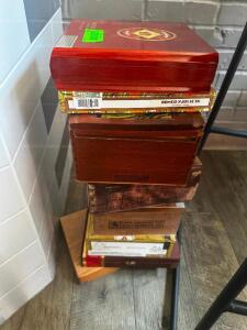 DESCRIPTION: (8) ASSORTED EMPTY CIGAR BOXES LOCATION: BAR / MAIN FLOOR THIS LOT IS: ONE MONEY QTY: 1
