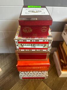 DESCRIPTION: (8) ASSORTED EMPTY CIGAR BOXES LOCATION: BAR / MAIN FLOOR THIS LOT IS: ONE MONEY QTY: 1