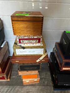 DESCRIPTION: (8) ASSORTED EMPTY CIGAR BOXES LOCATION: BAR / MAIN FLOOR THIS LOT IS: ONE MONEY QTY: 1