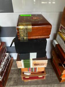 DESCRIPTION: (8) ASSORTED EMPTY CIGAR BOXES LOCATION: BAR / MAIN FLOOR THIS LOT IS: ONE MONEY QTY: 1