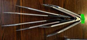 DESCRIPTION: (4) STAINLESS TONGS LOCATION: MAIN DINING QTY: 4