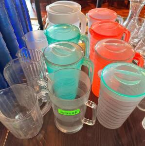 NAME: (12) - PLASTIC PITCHERS DESCRIPTION: (12) - PLASTIC PITCHERS LOCATION: MAIN DINING QTY: 12