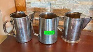 NAME: (3) - PITCHERS DESCRIPTION: (3) - STAINLESS PITCHERS LOCATION: MAIN DINING QTY: 1