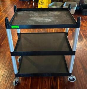 DESCRIPTION: 3-TIER PLASTIC UTILITY CART SIZE: 24"X16"X32" LOCATION: MAIN DINING QTY: 1