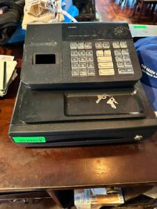 NAME: CASIO CASH REGISTER DESCRIPTION: CASIO CASH REGISTER LOCATION: MAIN DINING QTY: 1