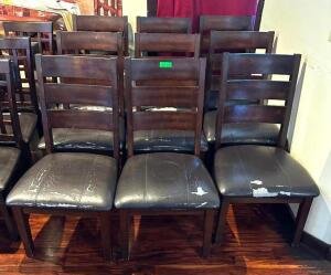 DESCRIPTION: (9) WOODEN CHAIRS WITH VINYL UPHOLSTERED SEATS INFORMATION: MOST NEED TO BE REUPHOLSTERED LOCATION: MAIN DINING QTY: 9