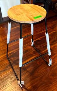 DESCRIPTION: WOOD SEAT BARSTOOL SIZE: 28" SEAT HEIGHT LOCATION: MAIN DINING QTY: 1