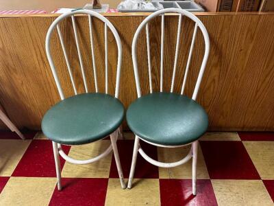 DESCRIPTION: (14) METAL BISTRO CHAIRS W/ GREEN PADDED SEATS ADDITIONAL INFORMATION SEATS ARE IN GOOD CONDITION LOCATION: FRONT THIS LOT IS: SOLD BY TH