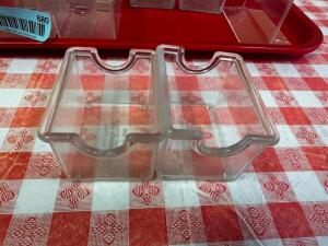 DESCRIPTION: (10) CLEAR PLASTIC SUGAR CADDYS LOCATION: FRONT THIS LOT IS: ONE MONEY QTY: 1