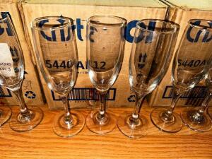 DESCRIPTION: (24) CHAMPAGNE FLUTES LOCATION: MAIN SEATING THIS LOT IS: SOLD BY THE PIECE QTY: 24