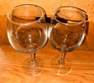 DESCRIPTION: (24) SMALL WINE GLASSES LOCATION: MAIN SEATING THIS LOT IS: SOLD BY THE PIECE QTY: 24