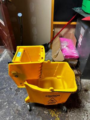 DESCRIPTION: YELLOW MOP BUCKET W/ WRINGER LOCATION: BATHROOMS QTY: 1