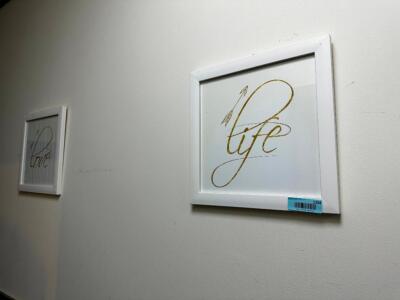 DESCRIPTION: (2) SMALL FRAMED PIECES OF WALL ART. LOCATION: BATHROOMS THIS LOT IS: ONE MONEY QTY: 1