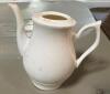 DESCRIPTION: (12) SMALL CERAMIC TEA PITCHERS LOCATION: MAIN SEATING THIS LOT IS: SOLD BY THE PIECE QTY: 12