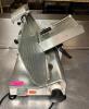 DESCRIPTION: 10" MANUAL DELI SLICER WITH SHARPENER BRAND/MODEL: FLEETWOOD BY SKYMSEN LOCATION: KITCHEN QTY: 1