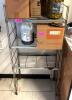 DESCRIPTION: 3-TIER WIRE METAL SHELF INFORMATION: CONTENTS NOT INCLUDED SIZE: 24"X12"X50" LOCATION: SIDE KITCHEN QTY: 1