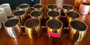 DESCRIPTION: (12) MULE MUGS LOCATION: BAR QTY: 12