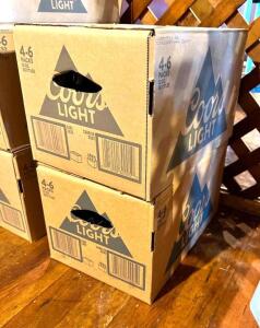 DESCRIPTION: (2) FULL CASES OF COORS LIGHT INFORMATION: 48 TOTAL BOTTLES LOCATION: MAIN DINING QTY: 2