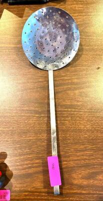 DESCRIPTION: STRAINER SPOON LOCATION: MAIN DINING QTY: 1