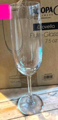 DESCRIPTION: (2) CASES OF FLUTE GLASSES INFORMATION: 12 GLASSES PER CASE LOCATION: MAIN DINING QTY: 2