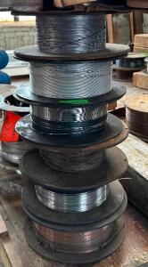 (6) - ROLLS OF PARTIALLY USED WELDING WIRE