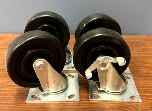 (4) INDUSTRIAL PLATE CASTERS