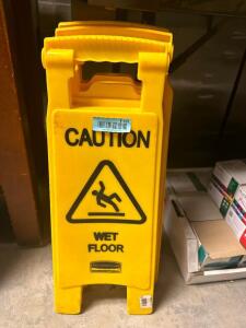 DESCRIPTION: (2) WET FLOOR SIGNS LOCATION: BAY 6 THIS LOT IS: SOLD BY THE PIECE QTY: 2