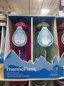 DESCRIPTION: (2) WATER BOTTLES WITH TIME STAMPS BRAND/MODEL: THERMOFLASK INFORMATION: BLACK AND BLUE TRANSPARENT SIZE: 32 OZ RETAIL$: $52.52 TOTAL QTY