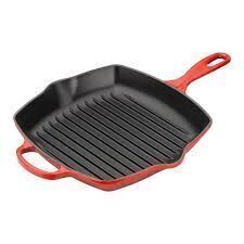 DESCRIPTION: (1) CAST IRON GRILL PAN BRAND/MODEL: LE CREUSET INFORMATION: ORANGE RETAIL$: $32.99 EA QTY: 1