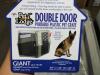 DESCRIPTION: (1) TWO DOOR DOG CRATE, PORTABLE BRAND/MODEL: PET LODGE INFORMATION: 130 LBS SIZE: GIANT SIZE, 49"L X 32"W X 35"H RETAIL$: $873.62 EA QTY - 7