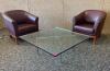 DESCRIPTION 3-PIECE CONVERSATION SET ADDITIONAL INFORMATION INCLUDES: (2) LEATHER ARMCHAIRS & (1) 40" X 42" GLASS COFFEE TABLE LOCATION MAIN LOBBY THI