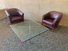 DESCRIPTION 3-PIECE CONVERSATION SET ADDITIONAL INFORMATION INCLUDES: (2) LEATHER ARMCHAIRS & (1) 40" X 42" GLASS COFFEE TABLE LOCATION MAIN LOBBY THI - 4