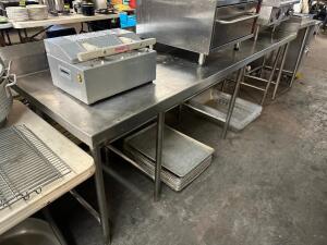 102" X 30" HEAVY DUTY STAINLESS TABLE W/ 6" BACK AND RIGHT SIDE SPLASH GUARD.