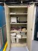 DESCRIPTION 2-DOOR METAL STORAGE CABINET W/ CONTENTS INCLUDED LOCATION TELEPHONE EQUIPMENT ROOM SIZE 36" X 24" X 80" THIS LOT IS ONE MONEY QUANTITY 1 - 3