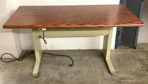 DESCRIPTION ELECTRIC RISING TABLE LOCATION MAIL ROOM STORAGE AREA SIZE 60"X30" QUANTITY: X BID 1